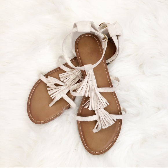 white tassel sandals
